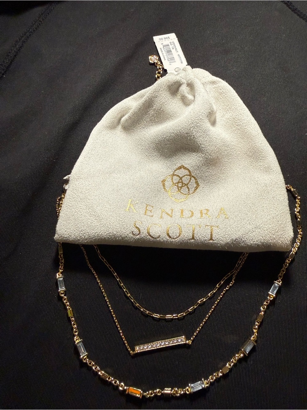Kendra Scott Gold Mini Pouch with Gold Layered Necklace